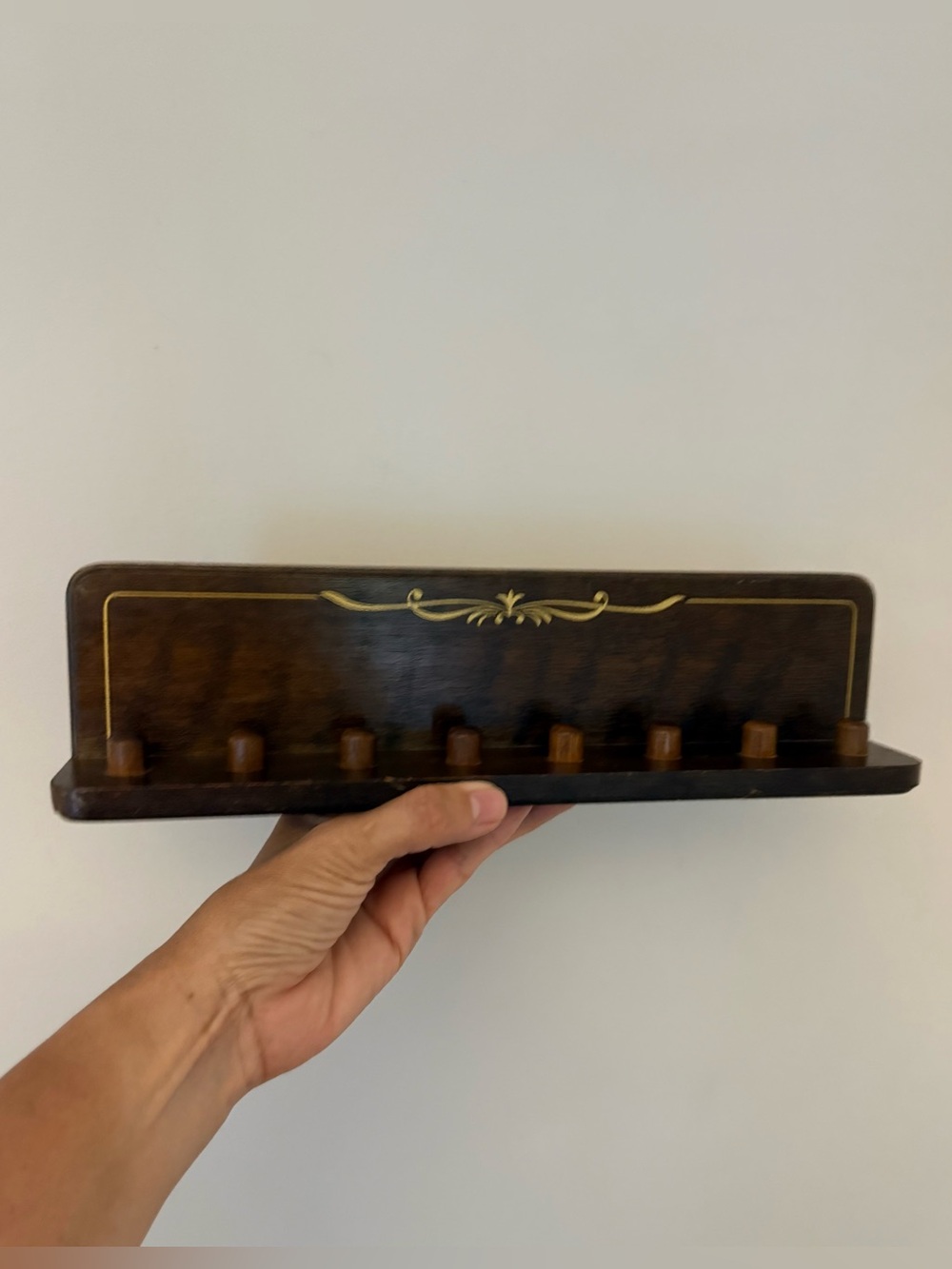 Vintage little wooden thimble display wall shelf. Trinkets.